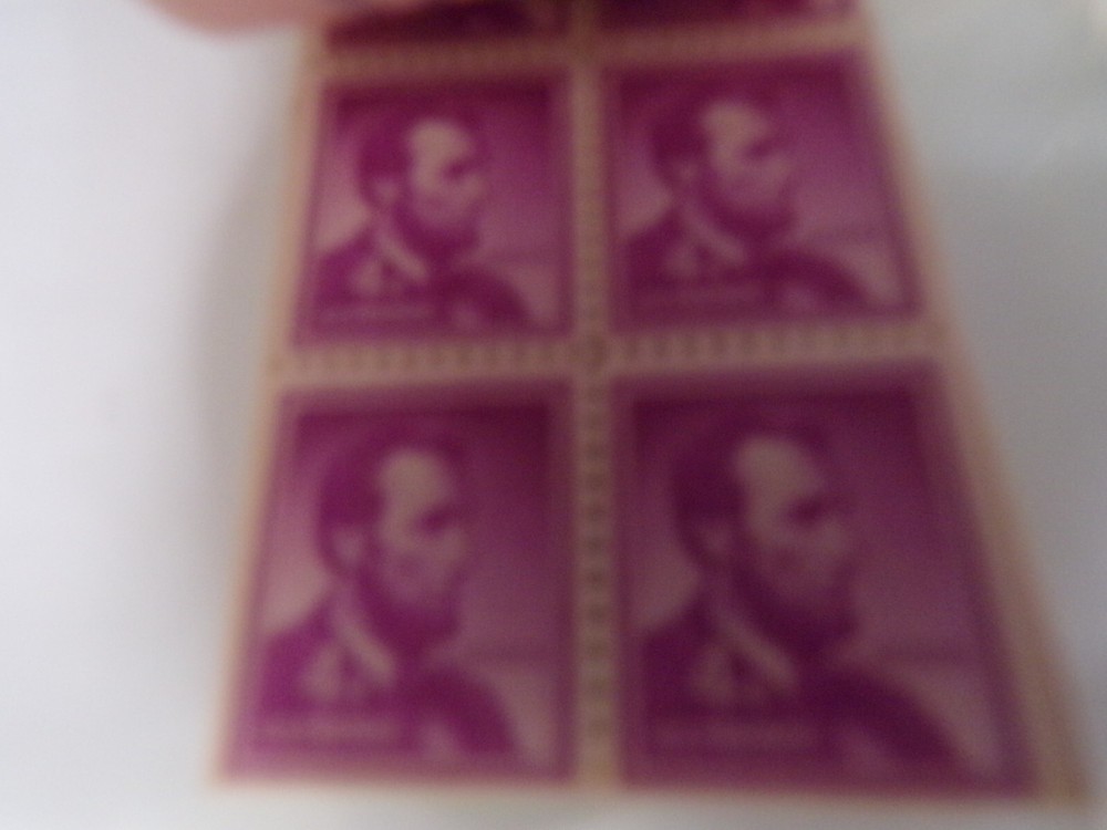 24 4 CENT PURPLE LINCOLN STAMPS MNH IN THE ORIGINAL BOOK
