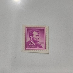 U.S. 4 Cent Abraham Lincoln Purple Postage Stamp