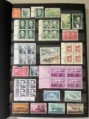 Various US mint stamps with a 16-page stamp album in excellent condition