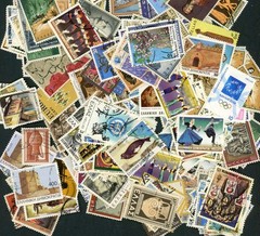 100 worlwide stamps off paper used Not exactly what is shown