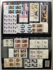 Various US mint stamps with a 16-page stamp album in excellent condition