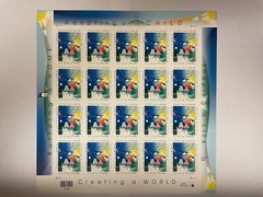 1999 Adopting a Child Creating a World Pane of 20 33 Cent Stamps