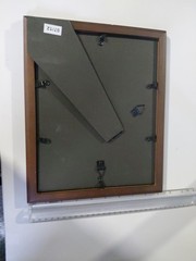 50th anniversary of the first major motion picture with sound stamp. Framed