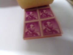 24 4 CENT PURPLE LINCOLN STAMPS MNH IN THE ORIGINAL BOOK
