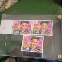 Elvis Presley stamp USA unused untouched pink and purple Elvis holding microphon