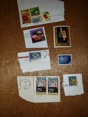 104 Postage stamps, some circulated, some not.  Some hinged, some not.